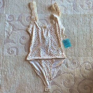 Sunny Spot Collection Forever 21 body suit shirt. Cream color with pink.